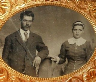 Small 1/9th Size Tintype With Horizontal View Of Couple In Brass Frame