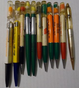 11 Non Travel Vintage Advertising Floaty Pens And Mechanical Pencils
