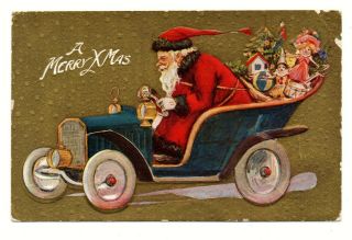 Vintage Embossed Postcard Santa Claus Driving Automobile " A Merry Xmas " 1900s