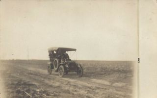 People Driving Old Antique Car On Dirt Road Vintage Real Photo Postcard