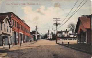 1912 Stores Main St.  Looking North Wakefield Ri Post Card