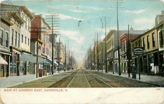 1911 Ohio Postcard: Stores On Main Street Looking East,  Zanesville,  Oh