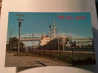 The Soo Locks - Saulte Ste.  Marie,  Mi With Freighter Passing Through