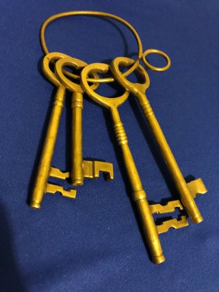 4 Antique Skeleton Keys On A Ring -