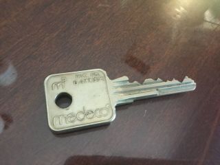 One (1) - Medeco High Security Key - Art - Collectors - Locksmith