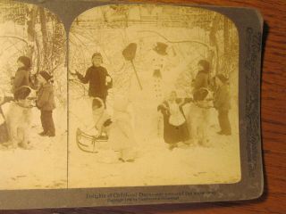 45 Stereoview Photo Card Kids Playing In Snow Snowman Sled Dog Children Winter