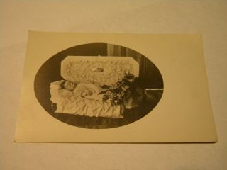 A Real Photo Post Mortem Postcard Of A Child In His Coffin