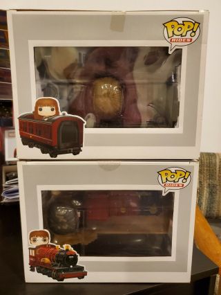 FUNKO POP RIDES HOGWARTS EXPRESS WITH HARRY POTTER & HERMIONE.  NM.  IN PROTECTORS 5