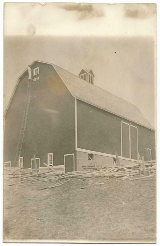 Barn Construction Worker On Very Tall Ladder Rppc Real Photo Postcard C.  1910