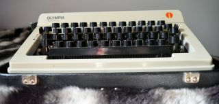 1970s Vintage Olympia Typewriter With Case,  Ribbons,  And Maintenance Kit