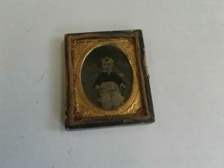 small antique tintype? photo in gold foil of small child.  Vintage. 3