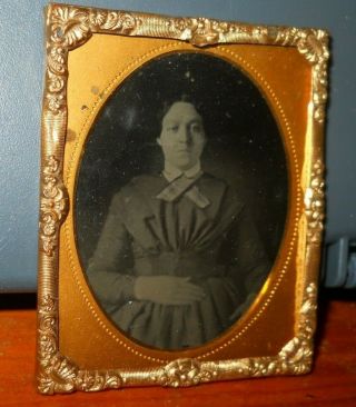 1/9th Plate Size Tintype Photo Of Lady In A Brass Frame