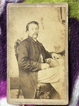Vintage Photograph Of Man In A Chair