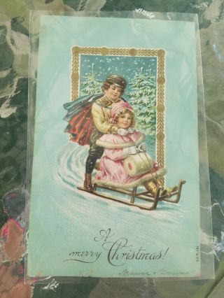Vintage " A Merry Christmas " Embossed Postcard Children Sledding 12 Languages