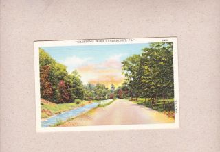 1948 Postcard Greetings From Vandergrift Pa Tree Lined Road Stream White Fence