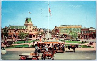 Vintage Disneyland Ca Postcard " Busy Day At Town Square " Trolley 1956 Cancel