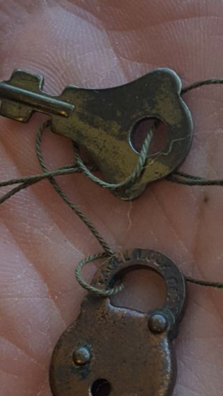 Vintage Antique Old Small Eagle Lock Co brass,  unique,  with key 4