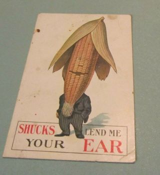 1910 Era Shucks Lend Me Your Ear Anthropomorphic Corn Cob Head Comic Postcard