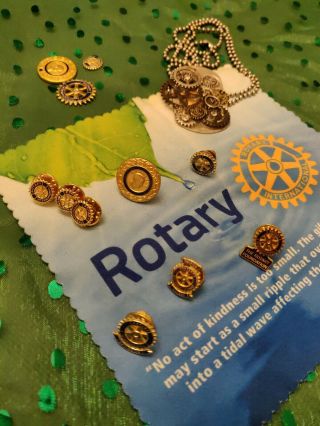 8 Rotary International Pins - Paul Harris,  Lens Cleaner & Various Wheels.