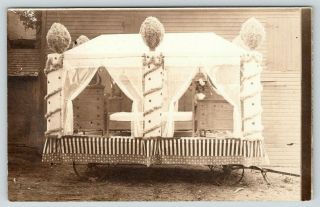 Rppc Little Girl Peeks Between Chest Of Drawers & Bed Furniture Store Float 1910