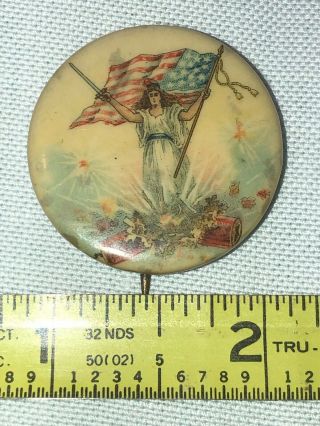 Antique Celluloid Lady Liberty Firecracker Pin Back Button