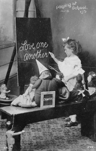 M2331 Young Girl With Dolls Postcard,