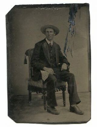 Antique 1/6th Plate Tintype Photograph Of Seated Man With Flag & Striped Socks