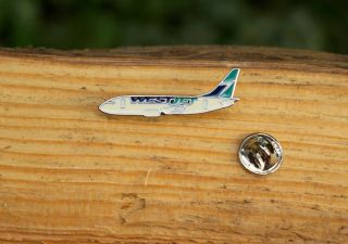 Westjet West Jet Airlines Airplane Silver Tone Metal & Enamel Lapel Pin Pinback