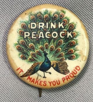 Drink Peacock It Makes You Proud Celluloid Antique Advertising Pin Pinback W&h