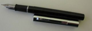 Vintage Sheaffer Fountain Pen,  Black Body,  Chrome Top and Chrome Fine Nib 3