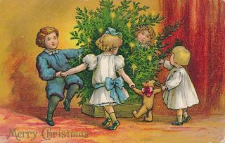 Christmas – Children And Teddy Bear Dancing Around Tree - 1909