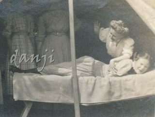 Ladies In A Tent Watch Lady Spanking Girl Lying Butt Up On Bed Old Camping Photo