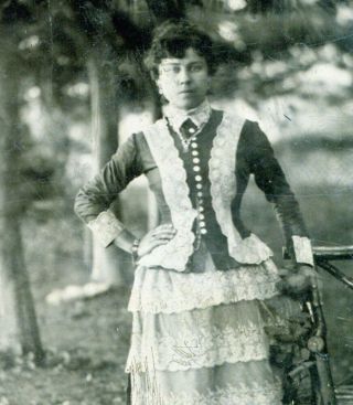 Outdoor Shot Of Stnading Woman In Great Skirt Jacket Combo