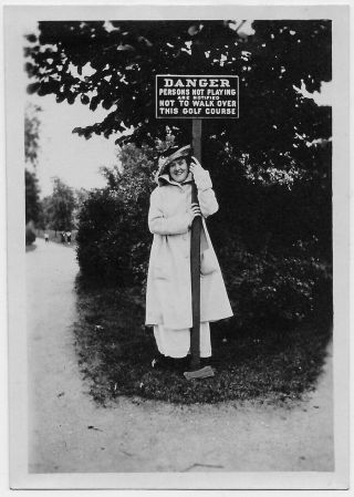 Old Photo Woman Wearing Coat And Hat Posing With Sign About Golf Course 1910s