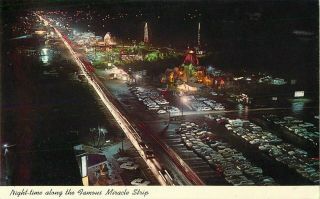 C1965 The Miracle Strip At Night,  West Panama City Beach,  Florida Postcard
