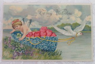 Vintage Valentine Postcard,  Cupid In A Canoe Made Of Forget Me Nots,  1911