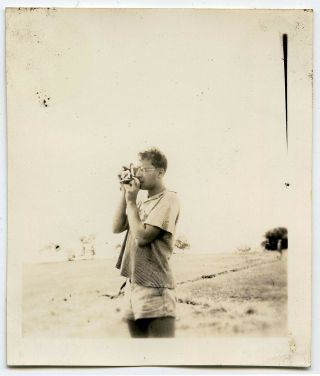 Young Man Taking Vintage Snapshot Photo At The Beach Bathing Suit Camera Fashion