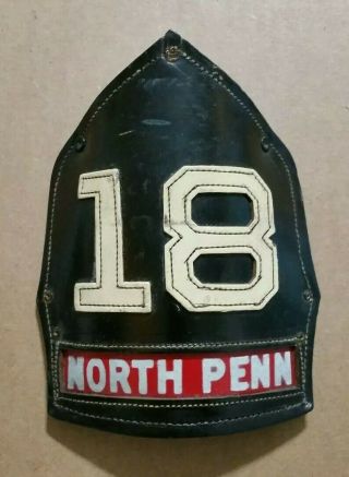 North Penn Volunteer Fire Co.  North Wales,  Pa. ,  Leather Fire Helmet Shield,  1950 