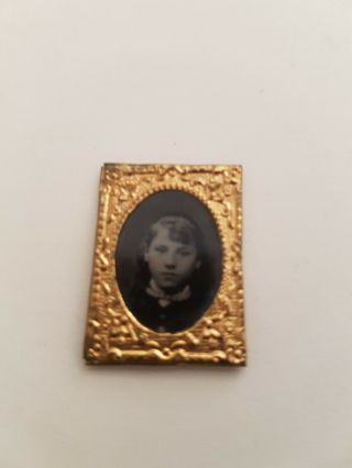 Tiny Victorian Photograph Of A Young Girl In Ornate Gilt Metal Frame