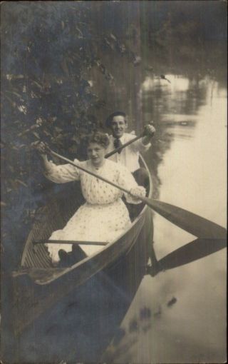 Man & Woman In Canoe Canoeing C1910 Real Photo Postcard