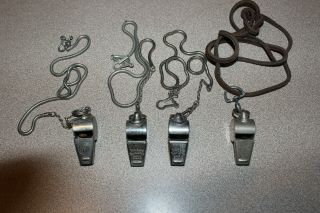 4 Vintage Whistles (3) Acme Thunderer W/1 Wilson Athletic Equipment & (1) Naped