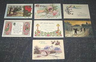 7 Antique Early 1900s Christmas Season Greetings Postcards