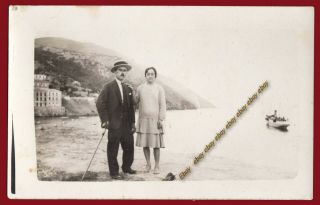 38025 Greece 1920s.  Man & Woman On The Beach.  Photo Pc Size Rppc