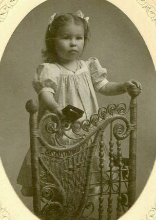 Antique Matted Photo Dainty Little Girl W Tiny Hair Bows On Rattan Chair