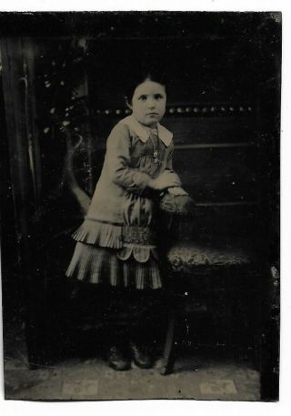 Tintype Photograph Precious Little Girl Leaning On Chair Full Dress