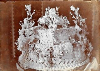 Old Photograph Of An Elaborate Cake With A Car On Top.