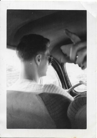 Vintage Photo Out Of Frame Hand Finger Pointing By Back Of Man Head Inside Car