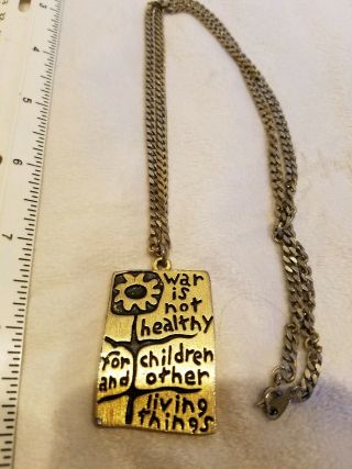 Vintage 1968 War Is Not Healthy For Children And Other Living Things Pendant