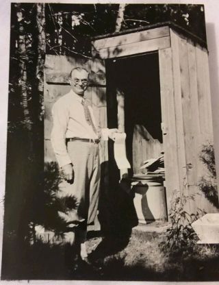 Vintage Old 1929 Photo Of Funny Man Holding Roll Of Toilet Paper By Outhouse