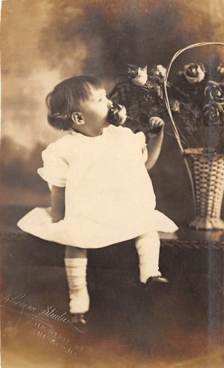 Chicago Orpheum Rppc Infant Loosie Stops To Smell The Roses In Wicker Vase C1910